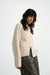 Cardigan Nad in Beige von der Seite by VIVAL.STUDIO