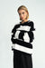 Cardigan Nad in schwarz weiss von vorne by VIVAL.STUDIO