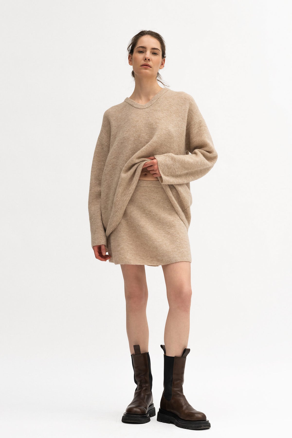 Minirock Eve in Beige Melange von vorne by VIVAL.STUDIO
